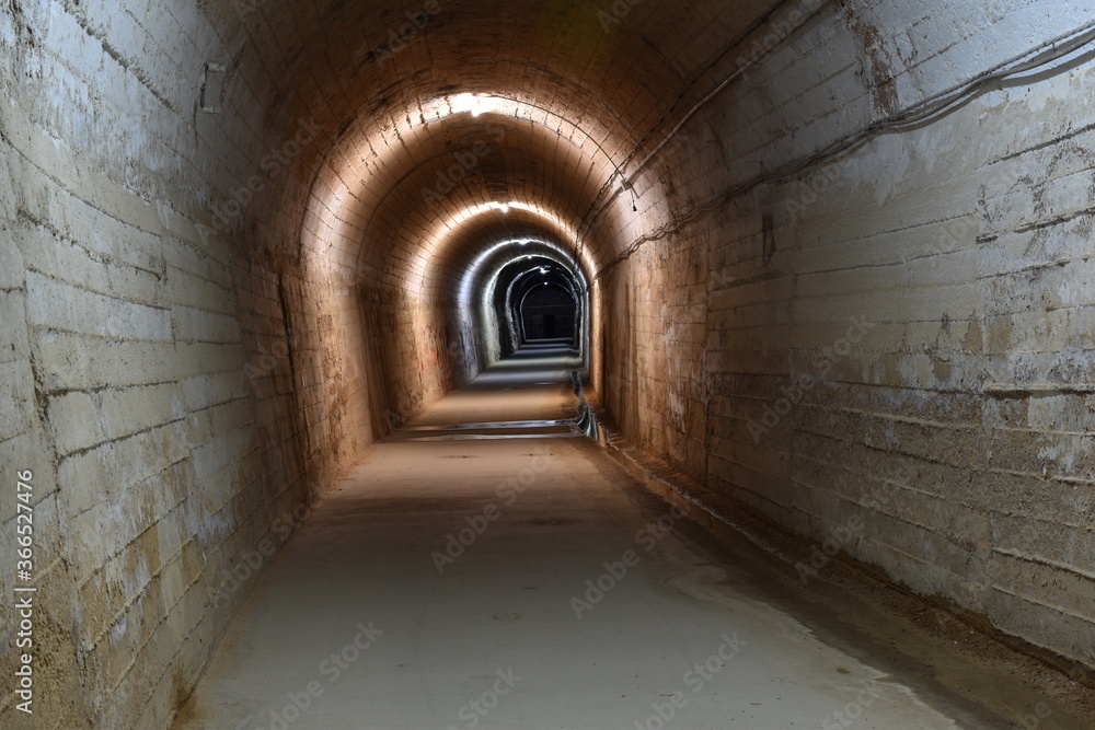 Lighted tunnel and old Arnedillo railway track.