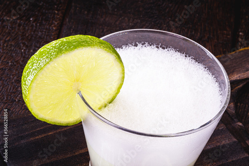 Pisco sour, a typical drink from Peru and Chile, prepared based on pisco and lemon, sweetened with cognac, eggs, served cold.