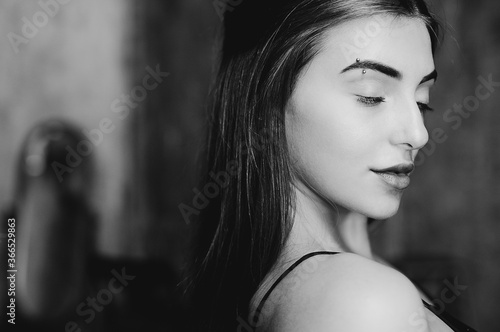 Black and white portrait of caucasian brunette © vitleo