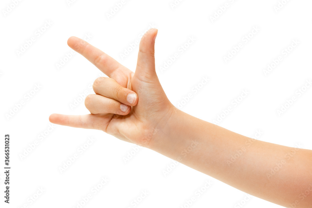 Rock sign. Children's hand, palm gesturing isolated on white studio background with copyspace for your advertising. Little girl's hand with signs. Childhood, education, sales, ad, expression concept. Rock sign. Children's hand, palm gesturing isolated on white studio background with copyspace for your advertising. Little girl's hand with signs. Childhood, education, sales, ad, expression concept.