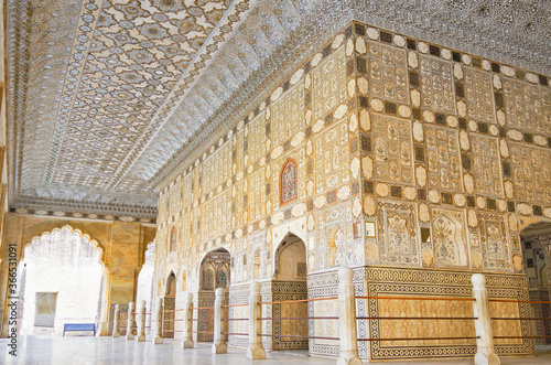 Breathaking details, textures and patterns on walls and ceilings inside Mirror Room in Amber Palace in Jaipur, Rajasthan in India  photo