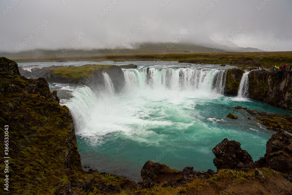 The Godafoss Icelandic: Goðafoss waterfall of the gods, is a famous waterfall in Iceland. The Godafoss Icelandic: Goðafoss waterfall of the gods, is a famous waterfall in Iceland.