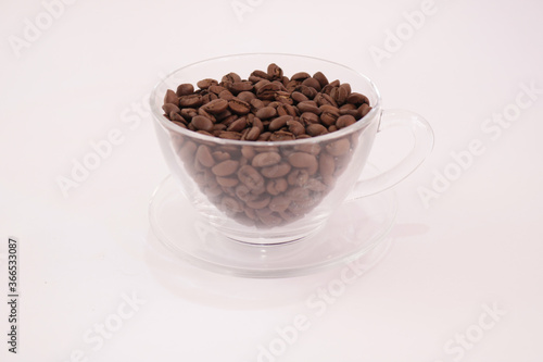 coffee beans in transparent cup