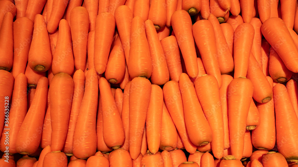 Beautiful ripe carrot background. Carrots in the supermarket. Thailand is known as a country with a smile. Beautiful ripe carrot background. Carrots in the supermarket. Thailand is known as a country with a smile.