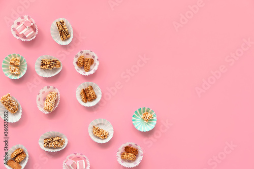 Crispy rice bars with marshmallow on color background