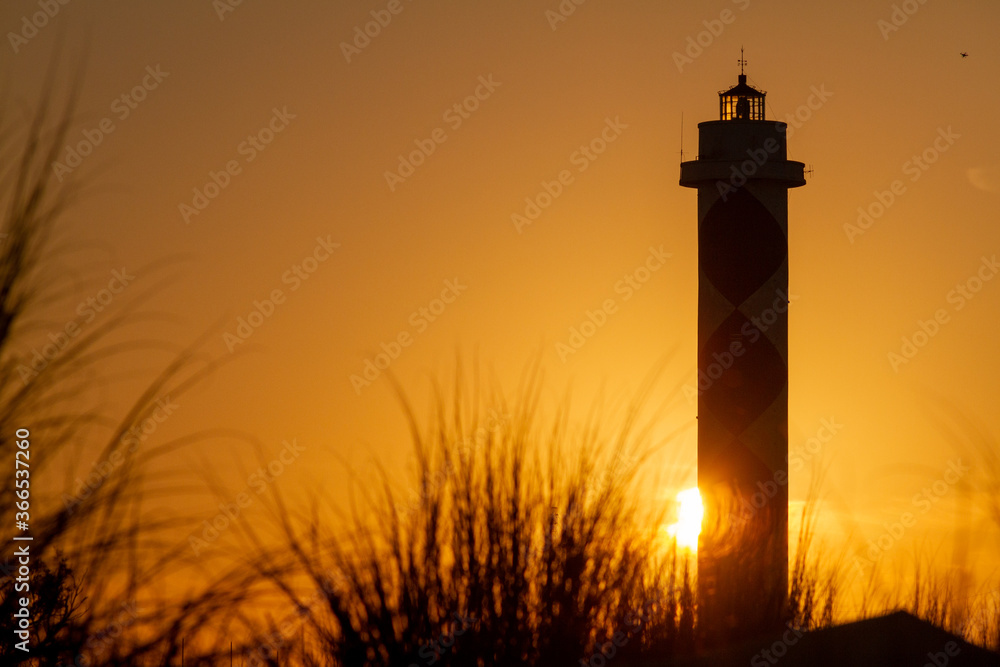 sunset behind the lighthouse