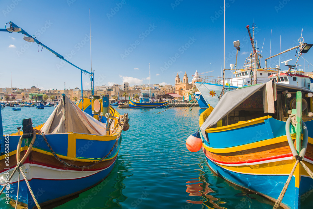 Il-Luzzu, the national boat of Malta, in the harbour of Marsaxlokk