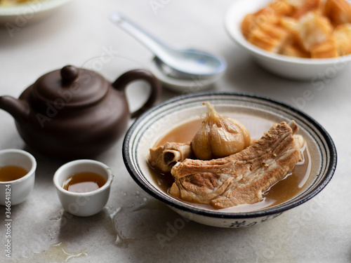 Photography Bak kut teh or Bakut is a pork rib dish cooked in broth, served in Malaysia and Singapore