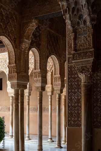 Moorish arches in the Court of the Lions in The Alhambra, Granada, Spain
