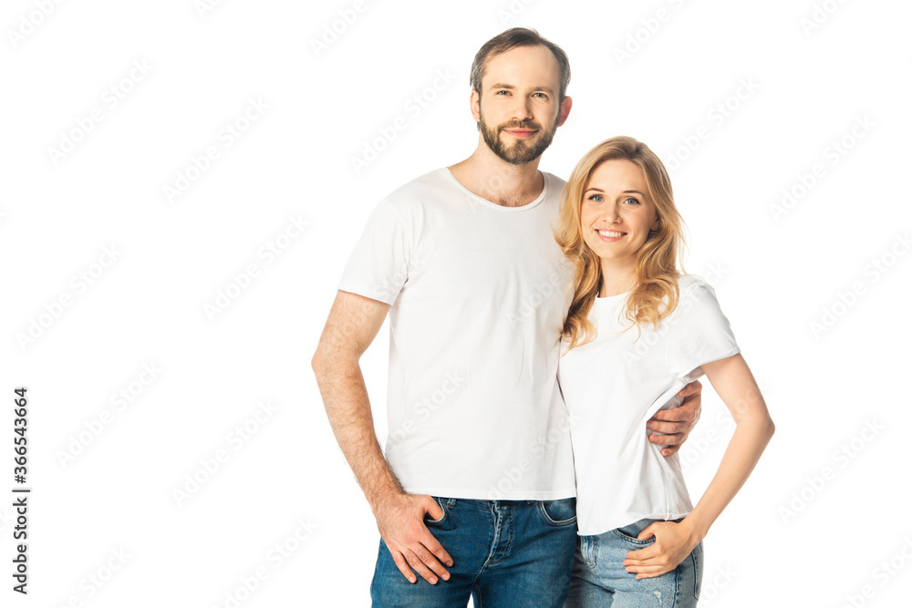 cheerful adult couple in white t-shirts embracing isolated on white cheerful adult couple in white t-shirts embracing isolated on white
