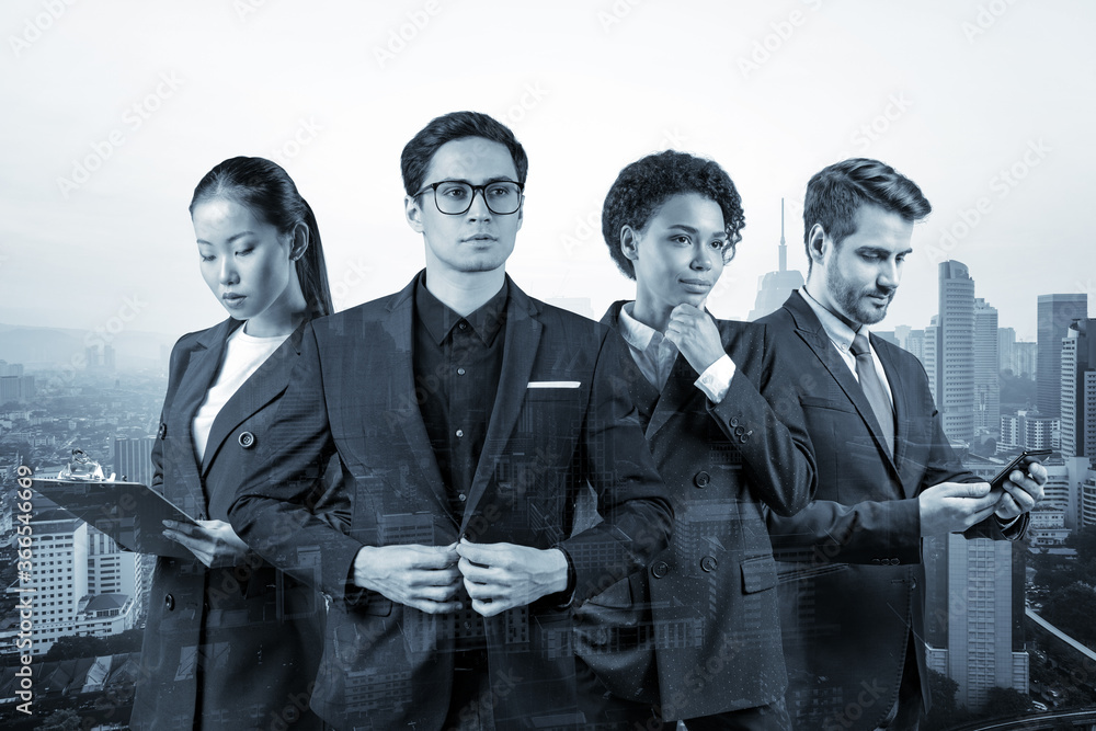Φωτογραφία Group of four business colleagues in suits working and dreaming about new career opportunities after MBA graduation