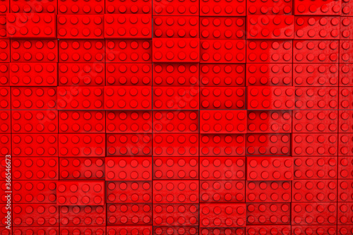 3d rendering of toy bricks on red background. 
minimalistic background. Wide background site head and cover photo. Pattern for texture of wallpaper.