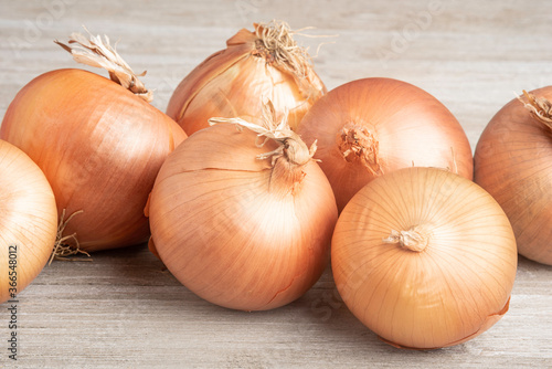 Sweet Southern-Grown Onions On A White Panel Board