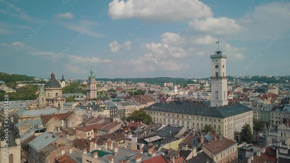 Aerial drone video of european city Lviv, Ukraine. Rynok Square, Central Town Hall, Dominican Church