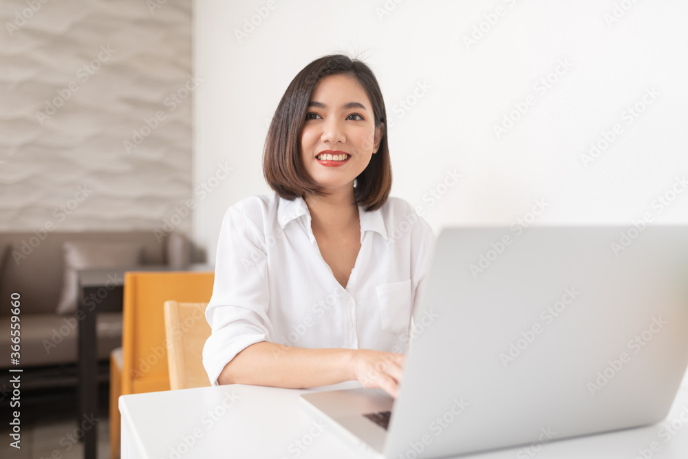 Asian business lady working in a random cafe Asian business lady working in a random cafe
