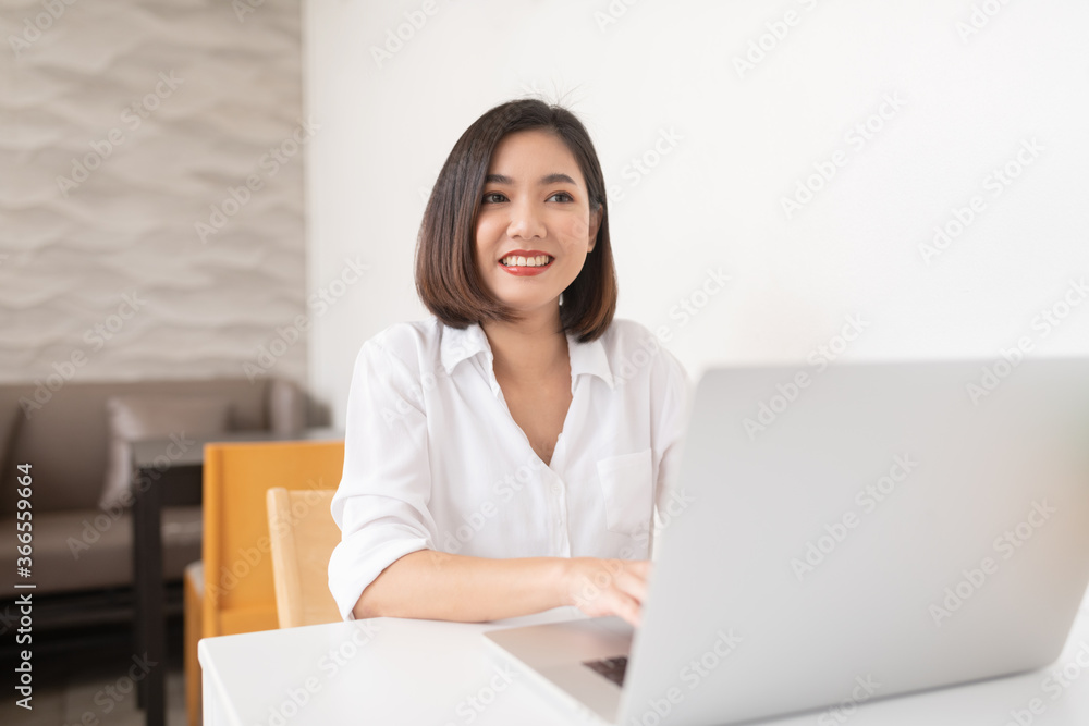 Asian business lady working in a random cafe Asian business lady working in a random cafe