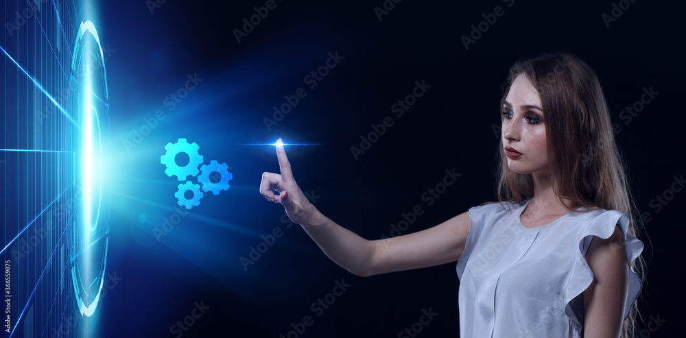 Business, Technology, Internet and network concept. Young businessman working on a virtual screen of the future and sees the inscription: Business, Technology, Internet and network concept. Young businessman working on a virtual screen of the future and sees the inscription: