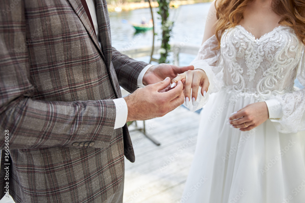 bride and groom holding hands