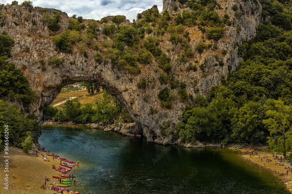 Pont d'Arc, France - Jul 15th 2020: a natural rock bridge considered as the entrance to the Ardèche Canyon