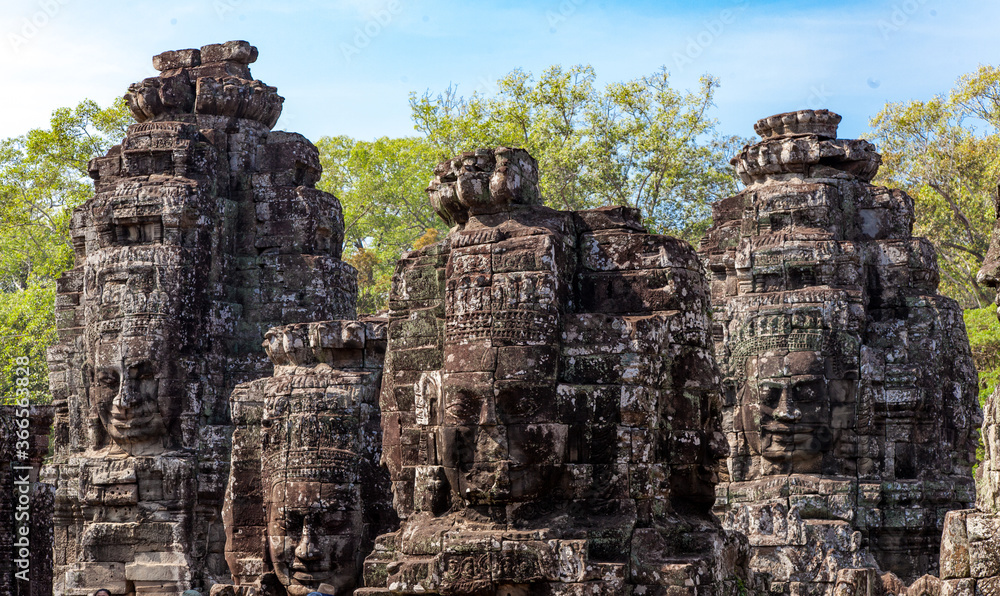 The Bayon is a temple at Angkor in Cambodia with the huge faces of Jayavarman 