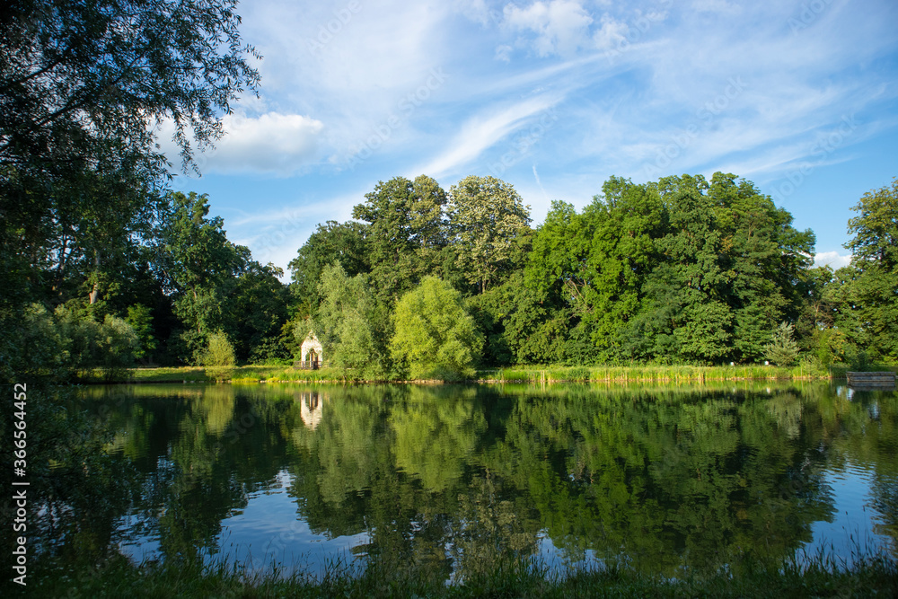 Magnificent Maksimir lakes in Zagreb city, beautiful, green oasis of several lakes in the city of Zagreb, with birch cottage on the left side of the photo