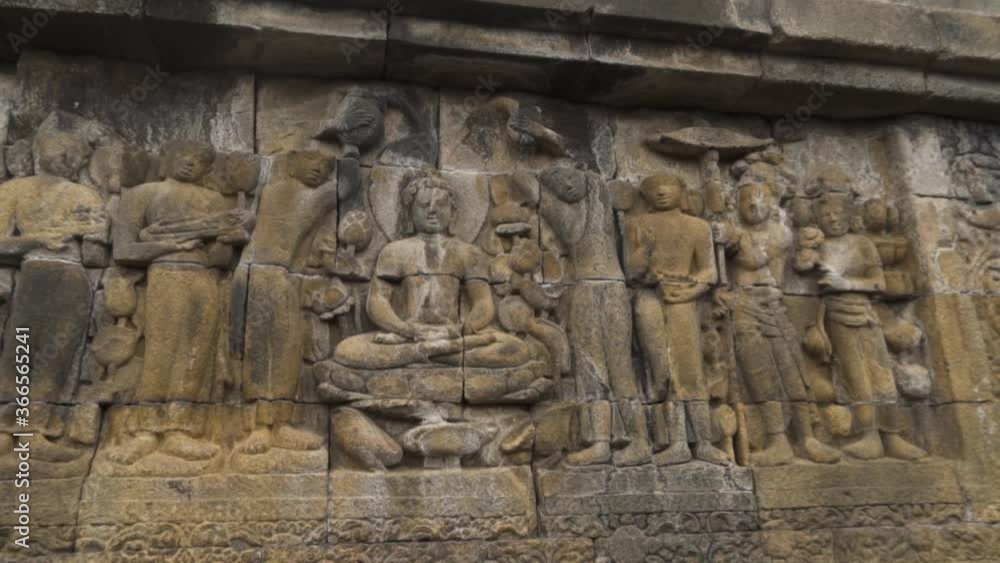 Candi Borobudur - Mahayana Javanese Buddhist Temple UNESCO World Heritage Site - Beautiful Buddha Reliefs in Yogyakarta Magelang, Central Java, Indonesia Indonesians Candi Borobudur - Mahayana Javanese Buddhist Temple UNESCO World Heritage Site - Beautiful Buddha Reliefs in Yogyakarta Magelang, Central Java, Indonesia Indonesians