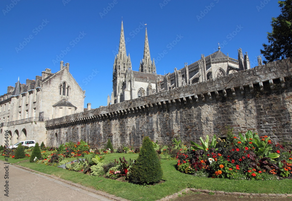 Quimper town in Brittany France. Wall of old town and a beautiful garden near the Cathedral of Saint Corentin. Tourism in France.