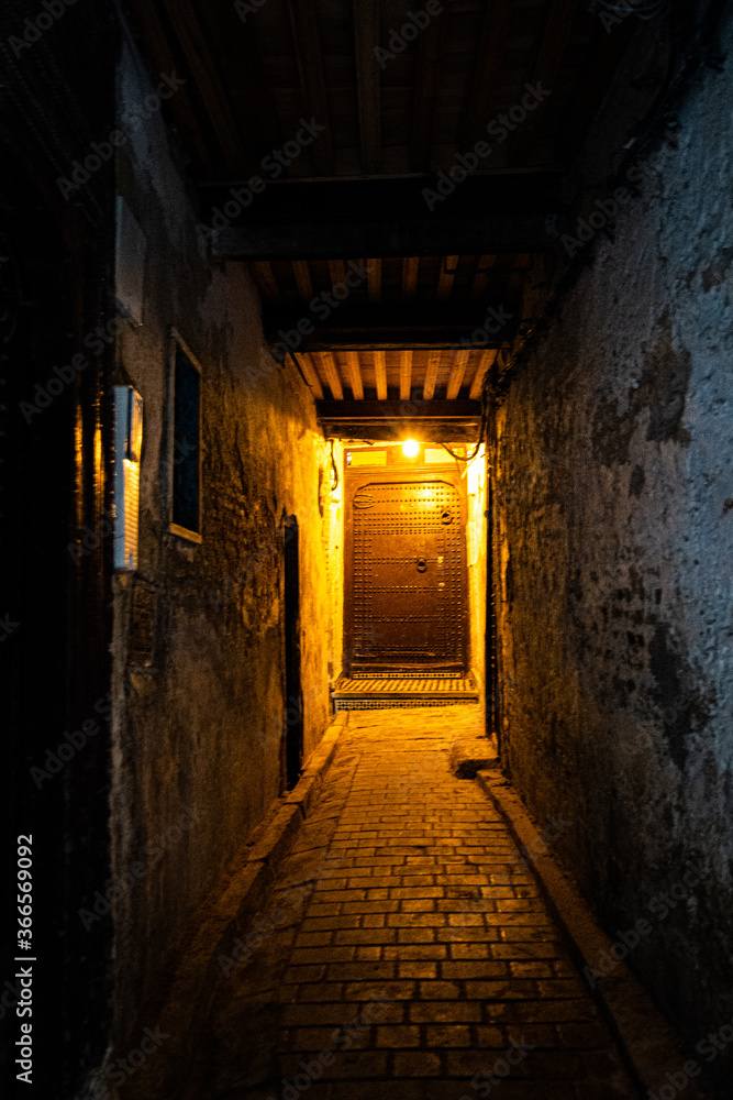 Dark alleys inside the old medina of Fez
