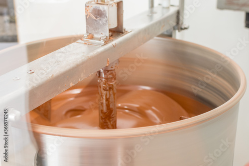 chocolate mixing machine spinning at set temperature