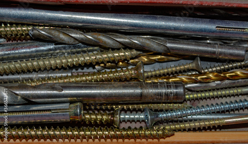 a set of various screws and anchor bolts for installation repair and maintenance close up