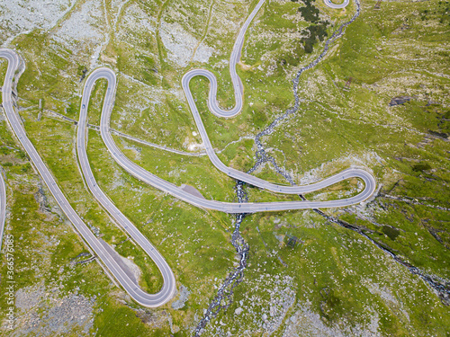 Transfagarasan road is one of the most spectacular mountain roads in the world. Beautiful long and curvy road viewed from a drone.