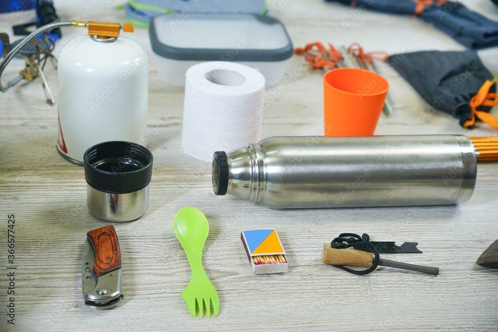 Things and accessories for tourism, travel and hiking, flat lay top view Things and accessories for tourism, travel and hiking, flat lay top view