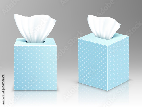 Paper napkin boxes, open packages with tissue wipes front and side view. Hygiene accessories, blue carton packages with polka dots pattern isolated on grey background, realistic 3d vector illustration