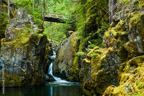 A trail bridge over Opal Creek in the Opal Creek Wilderness. It is a wilderness area located in the Willamette National Forest in Oregon.