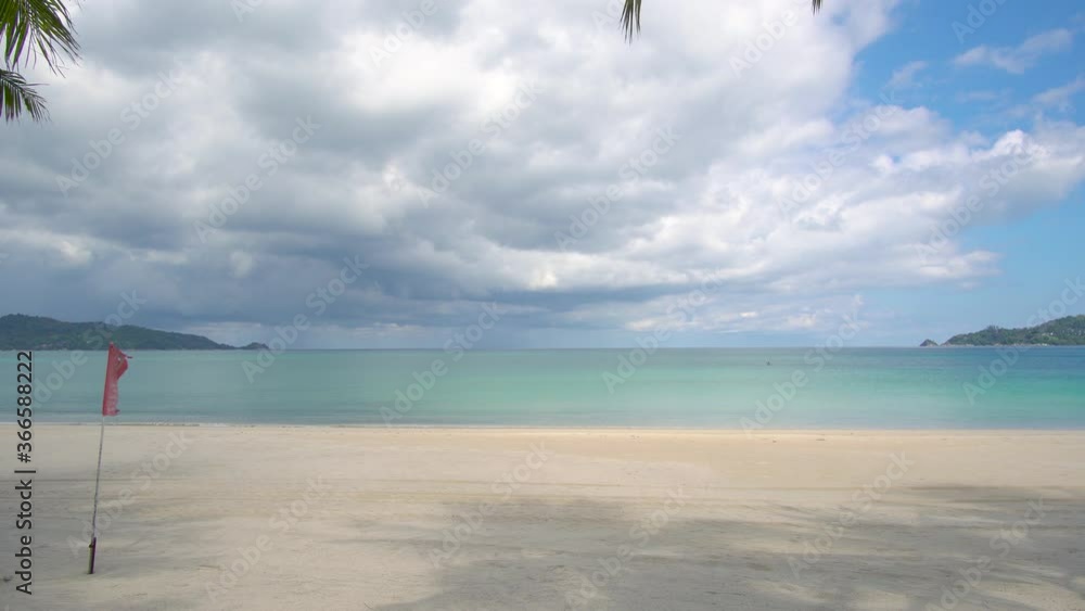 Phuket beach sea sand and sky. Landscape view of beach sea in summer day. Beach space area. At Karon Beach, Phuket, Thailand. On 15 June 2020. 4K UHD. Video Clip Phuket beach sea sand and sky. Landscape view of beach sea in summer day. Beach space area. At Karon Beach, Phuket, Thailand. On 15 June 2020. 4K UHD. Video Clip