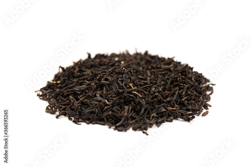 Leaves of black premium dry tea on a white background