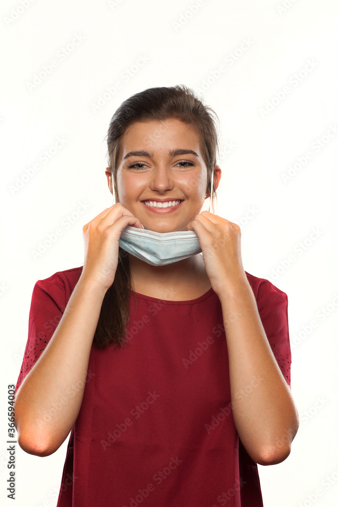 Teenage Girl Wearing a Surgical Mask Teenage Girl Wearing a Surgical Mask