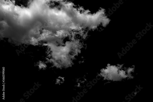 white fluffy clouds isolated on black