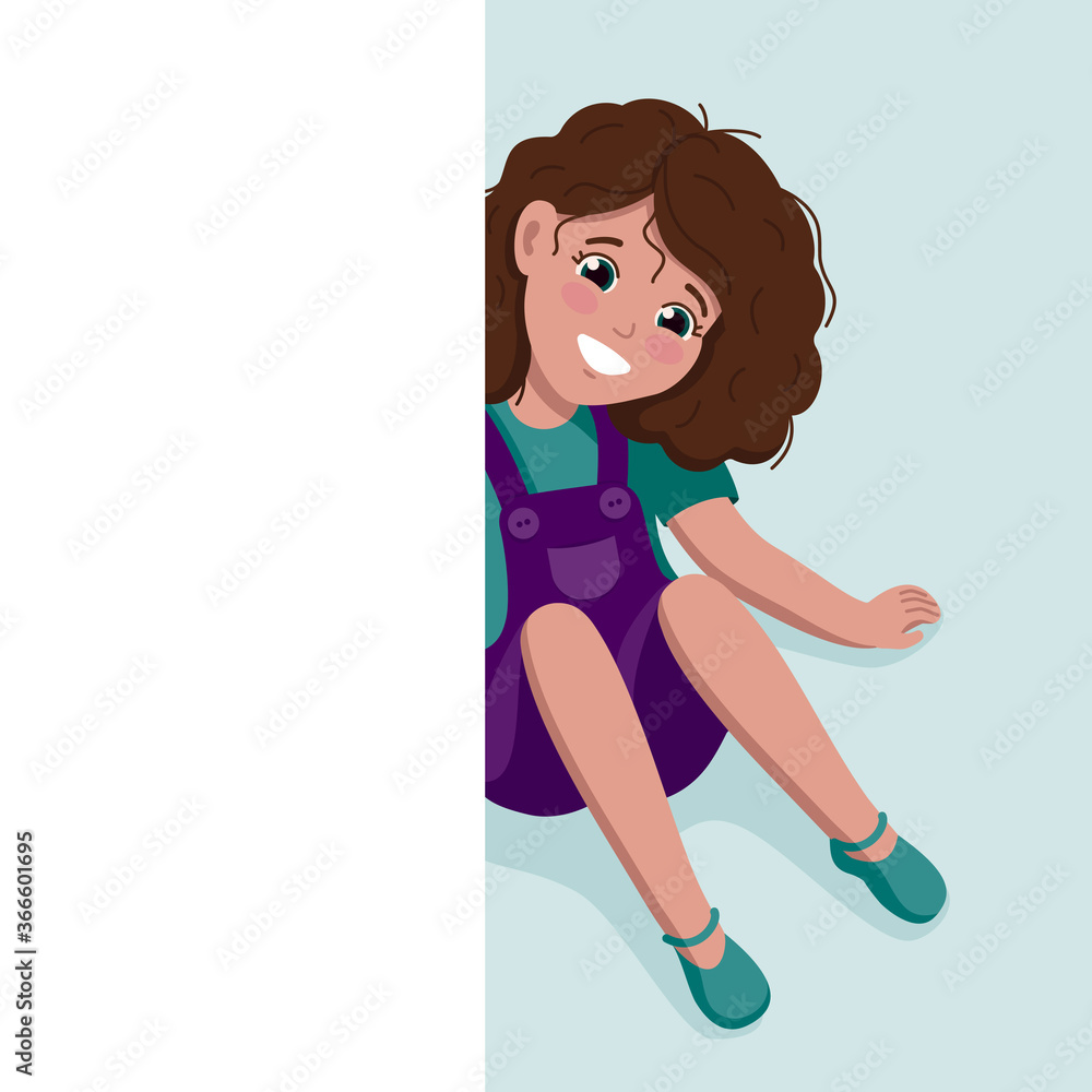 A cheerful girl sits and looks out from behind a white wall. A cheerful girl sits and looks out from behind a white wall.