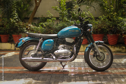 A motorcycle is washed and parked in a home garage during the corona global pandemic.