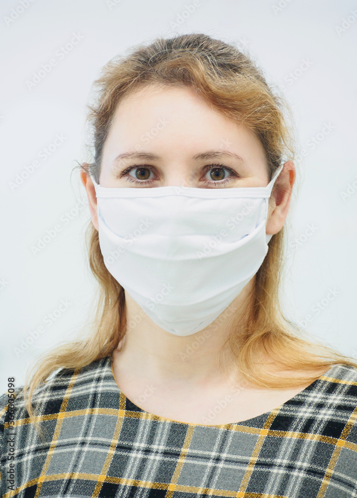 COVID-19 Pandemic Coronavirus. Woman wearing face mask protective for spreading of disease virus SARS-CoV-2. Girl with protective mask on face against Coronavirus Disease 2019. COVID-19 Pandemic Coronavirus. Woman wearing face mask protective for spreading of disease virus SARS-CoV-2. Girl with protective mask on face against Coronavirus Disease 2019.