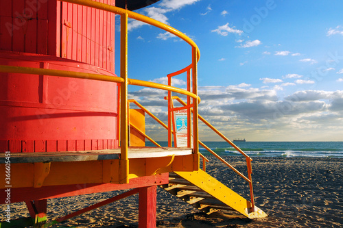 Stairs lead to a colorful Lifeguard Shelter on South Beach, Miami