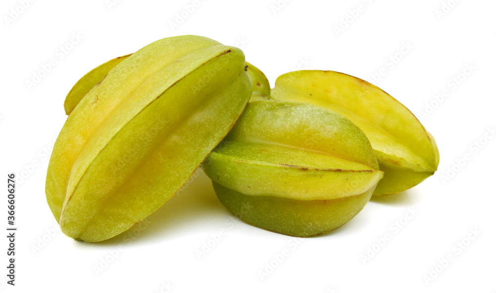 Carambola fruit with slices isolated on white background Carambola fruit with slices isolated on white background