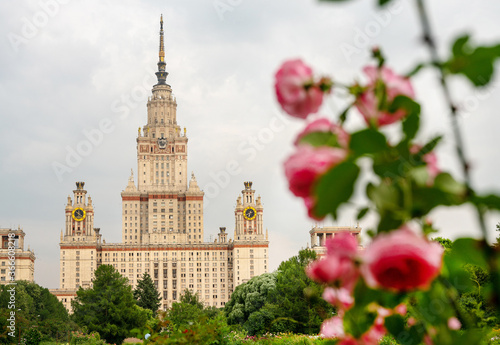 MMain building of Moscow University and amazing pink roses in boatnical garden of it