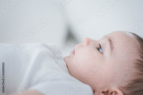 Baby in bed profile 