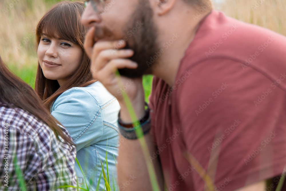 company of people meeting guy and girl lovely looking park outdoor summer time space and good weather