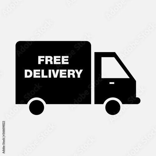Cargo truck with free delivery sign. Fast and free courier service icon.