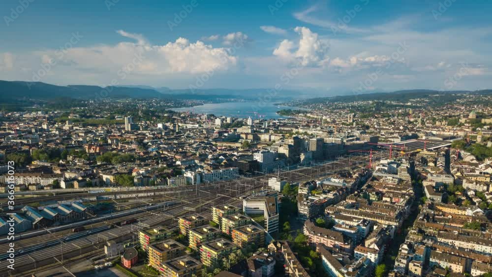 sunny day zurich cityscape river train station railways aerial panoramic 4k timelapse switzerland sunny day zurich cityscape river train station railways aerial panoramic 4k timelapse switzerland