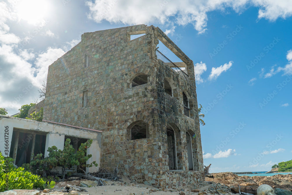 Worn down damage building due to hurricanes and natural disasters. Worn down damage building due to hurricanes and natural disasters.
