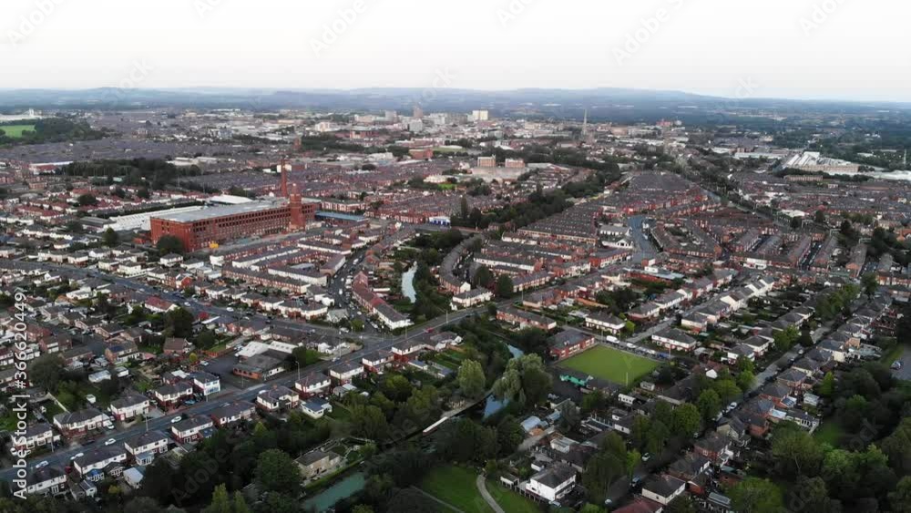 Reverse aerial view of the Tulketh Mill and Haslam Park at sunset Reverse aerial view of the Tulketh Mill and Haslam Park at sunset